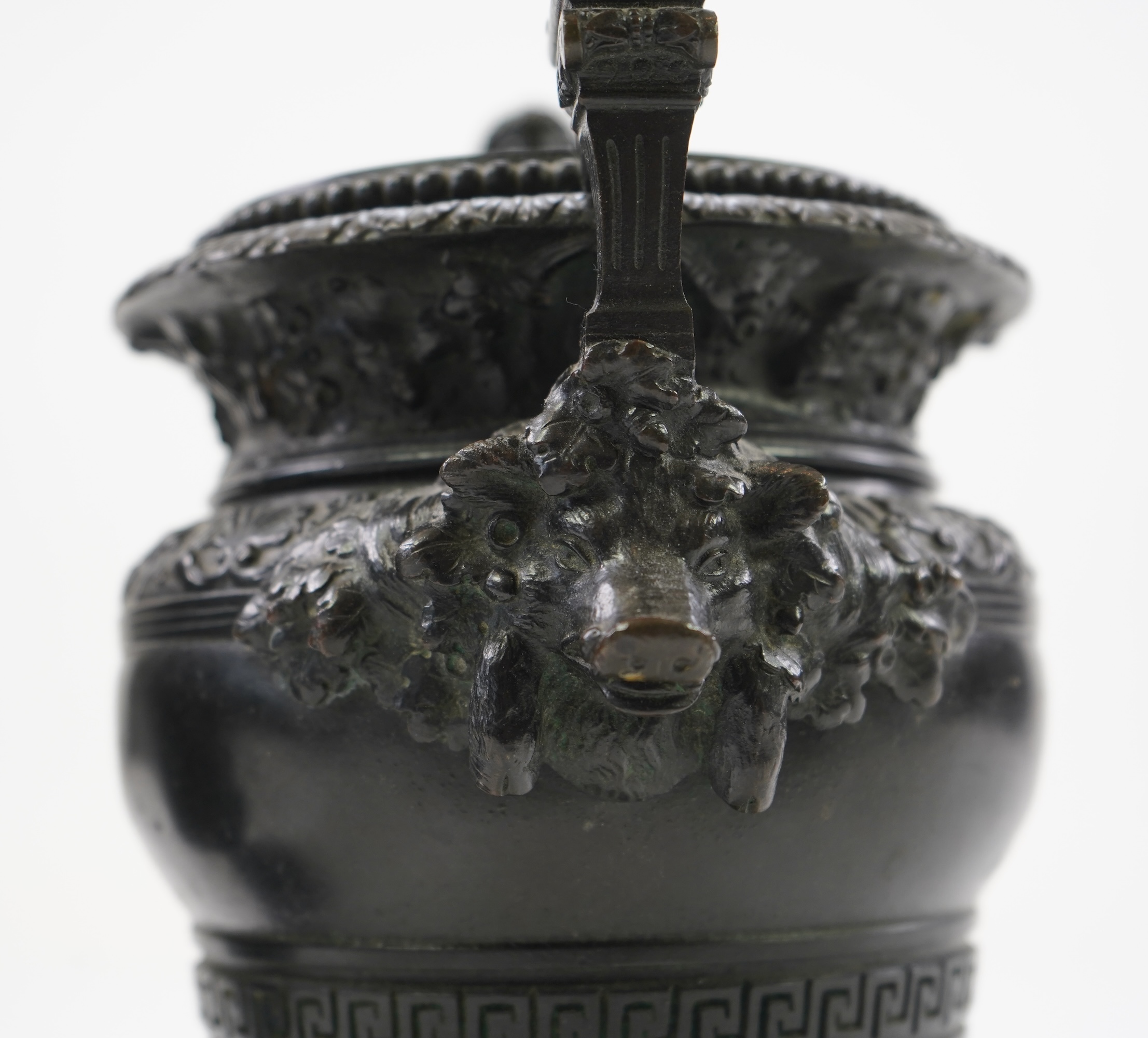 A pair of neoclassical revival bronze urns, late 19th century